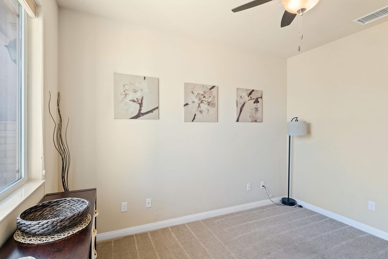 Carpeted bonus room flex space at Palms Place